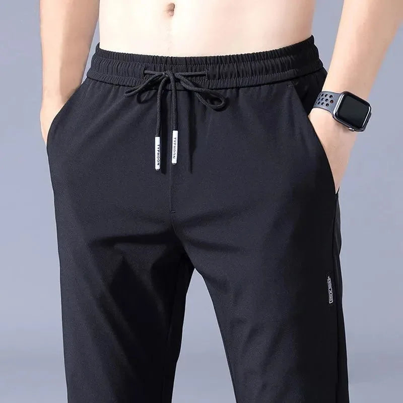 Ice Silk Male Pants 2026 Summer New Black Gray Thin Business Casual Pants Outdoor Elastic Breathable Straight Leg Sweatpants
